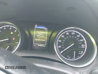 2019 Toyota Camry LE z VIN 4T1B11HK0KU698215, wystawiony jako IAAI lot #42319699 z przebiegiem 54 864 mil mil oraz . Historia ofert i sprzedaży dostępna na DreamBid. Obrazek 7.