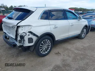 2016 Lincoln MKX Select with VIN 2LMPJ6KR7GBL59266, listed as a IAAI auction lot 42044990 with 131,233 mi miles. Bid and sale history available at carsss.com. Image 4.