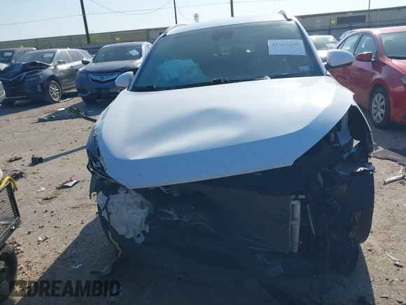 2021 Hyundai Tucson Value with VIN KM8J33A42MU314290, listed as a IAAI auction lot 41986298 with 32,740 mi miles and . Bid and sale history available at DreamBid. Image 13.