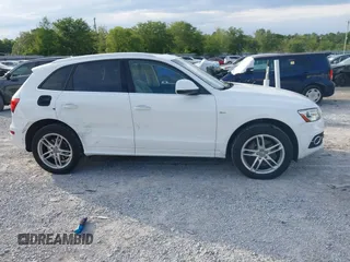 2015 Audi Q5 Premium Plus z VIN WA1DGAFPXFA054099, wystawiony jako IAAI lot #42192489 z przebiegiem 106 560 mil mil oraz . Historia ofert i sprzedaży dostępna na DreamBid. Obrazek 14.