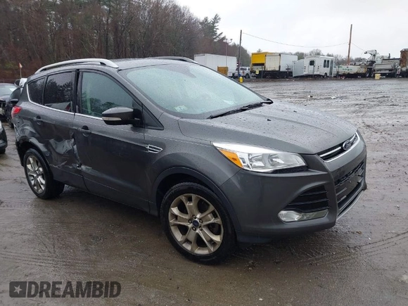 2015 Ford Escape Titanium with VIN 1FMCU9JX6FUB79093, listed as a IAAI auction lot 41805057 with 87,788 mi miles. Bid and sale history available at carsss.com. Image 1.