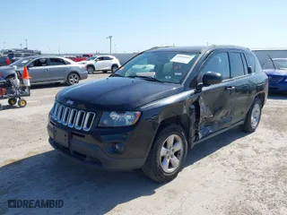 2014 Jeep Compass Sport with VIN 1C4NJCBA6ED630812, listed as a IAAI auction lot 42026664 with 134,445 mi miles. Bid and sale history available at carsss.com. Image 2.