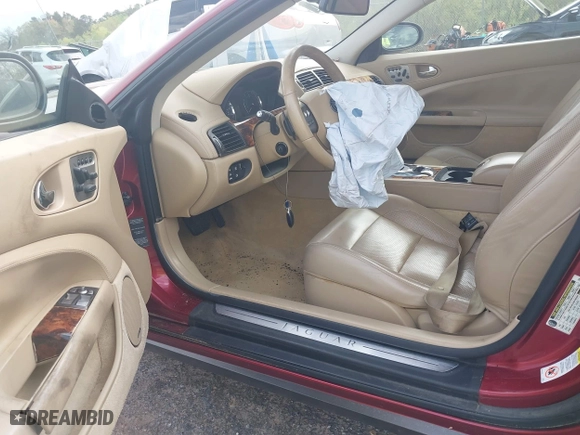 2008 Jaguar XK with VIN SAJWA44B485B24981, listed as a IAAI auction lot 41866497 with 84,920 mi miles. Bid and sale history available at carsss.com. Image 8.