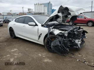 2022 BMW 8 Series 840i with VIN WBAGV4C01NCJ30083, listed as a Copart auction lot 81356084 with 61,868 mi miles and Salvage title. Bid and sale history available at DreamBid. Image 4.