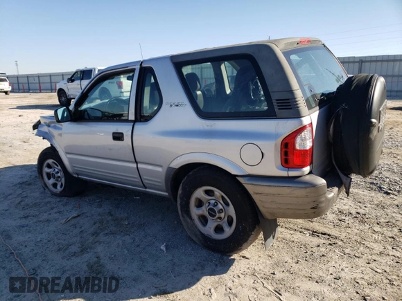 2002 Isuzu Rodeo z VIN 4S2CK57W524323426, wystawiony jako Copart lot #42191765 z przebiegiem 112 024 mil mil oraz Szkoda całkowita • Salvage title. Historia ofert i sprzedaży dostępna na DreamBid. Obrazek 2.