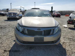 2013 Kia Optima SX с VIN 5XXGR4A63DG152535, выставлен на аукционе Copart как лот 63614895 с пробегом 172 394 миль миль и Списание • Salvage title. История ставок и продаж доступна на DreamBid. Изображение 5.