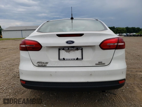 2016 Ford Focus SE z VIN 1FADP3F29GL358431, wystawiony jako Copart lot #63378655 z przebiegiem 152 115 mil mil oraz Szkoda całkowita • Salvage title. Historia ofert i sprzedaży dostępna na DreamBid. Obrazek 6.