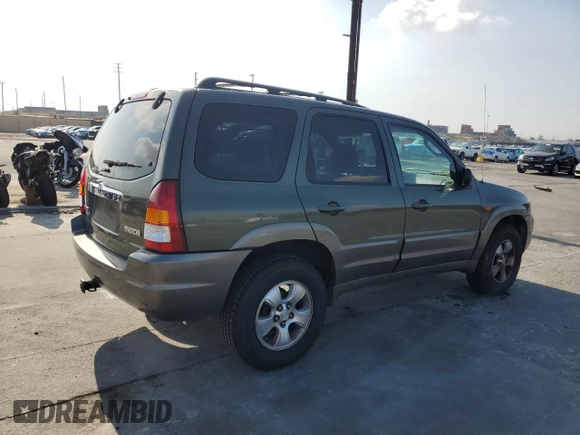 2002 Mazda Tribute LX with VIN 4F2YU08112KM16716, listed as a Copart auction lot 55095645 with 113,885 mi miles and Salvage Title. Bid and sale history available at DreamBid. Image 3.