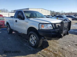 2005 Ford F-150 XL with VIN 1FTRF14535NB98598, listed as a Copart auction lot 88928675 with 214,304 mi miles and Salvage Title. Bid and sale history available at carsss.com. Image 4.
