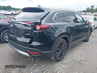 2022 Mazda CX-9 Touring Plus z VIN JM3TCBAY2N0619279, wystawiony jako IAAI lot #42373722 z przebiegiem 43 540 mil mil oraz . Historia ofert i sprzedaży dostępna na DreamBid. Obrazek 4.