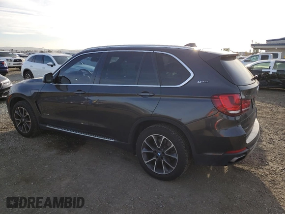 2018 BMW X5 xDrive40e iPerformance with VIN 5UXKT0C51J0W03594, listed as a Copart auction lot 47802005 with 59,670 mi miles and Salvage Title. Bid and sale history available at carsss.com. Image 2.