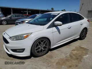 2016 Ford Focus SE with VIN 1FADP3F22GL329241, listed as a Copart auction lot 58095135 with 105,079 mi miles and Salvage title. Bid and sale history available at DreamBid. Image 1.