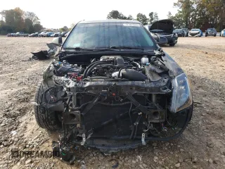 2012 Cadillac CTS-V z VIN 1G6DV8EP0C0149877, wystawiony jako Copart lot #77162544 z przebiegiem 70 309 mil mil oraz Szkoda całkowita • Salvage title. Historia ofert i sprzedaży dostępna na DreamBid. Obrazek 5.