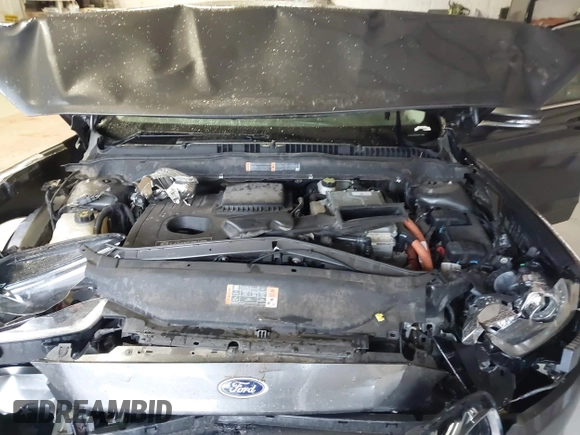 2016 Ford Fusion SE Hybrid with VIN 3FA6P0LU2GR388787, listed as a IAAI auction lot 41733661 with 86,078 mi miles and . Bid and sale history available at DreamBid. Image 10.