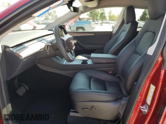 2024 Tesla Model Y Long Range with VIN 7SAYGAEE0RF016323, listed as a Copart auction lot 50253205 with 12,490 mi miles and Salvage title. Bid and sale history available at DreamBid. Image 7.