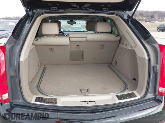 2013 Cadillac SRX Performance Collection with VIN 3GYFNHE34DS595277, listed as a IAAI auction lot 41618126 with 118,141 mi miles. Bid and sale history available at carsss.com. Image 17.