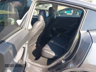 2023 Tesla Model Y Performance with VIN 7SAYGDEF5PF823122, listed as a IAAI auction lot 41546480 with 12,943 mi miles and . Bid and sale history available at DreamBid. Image 8.