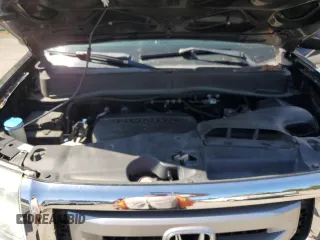 2011 Honda Pilot Touring with VIN 5FNYF4H92BB089912, listed as a Copart auction lot 52033125 with 159,080 mi miles and Salvage Title. Bid and sale history available at carsss.com. Image 12.