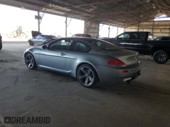 2006 BMW M6 with VIN WBSEH934X6B797428, listed as a Copart auction lot 63462135 with 73,393 mi miles and Salvage title. Bid and sale history available at DreamBid. Image 2.