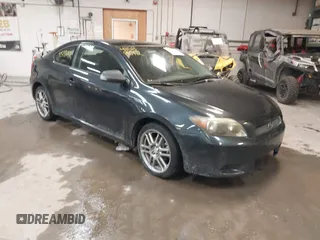 2007 Scion tC Spec with VIN JTKDE177870164952, listed as a IAAI auction lot 41589012 with 143,994 mi miles. Bid and sale history available at carsss.com. Image 1.