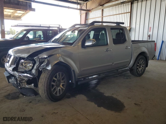 2009 Nissan Frontier SE with VIN 1N6AD07U69C403815, listed as a Copart auction lot 49161015 with 181,843 mi miles and Salvage Title. Bid and sale history available at carsss.com. Image 1.