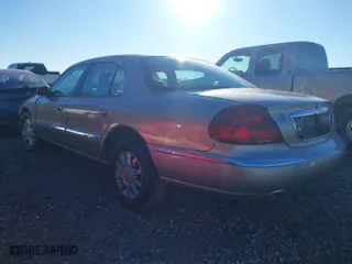 2002 Lincoln Continental with VIN 1LNHM97V12Y699605, listed as a IAAI auction lot 41235748 with 1 mi miles. Bid and sale history available at carsss.com. Image 3.