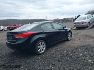 2012 Hyundai Elantra GLS with VIN KMHDH4AE6CU187099, listed as a IAAI auction lot 42037800 with 107,046 mi miles. Bid and sale history available at carsss.com. Image 4.