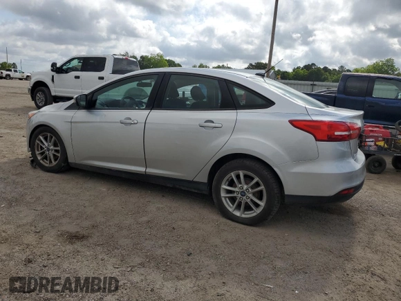 2017 Ford Focus SE with VIN 1FADP3F23HL328312, listed as a Copart auction lot 57028125 with 116,498 mi miles and Salvage title. Bid and sale history available at DreamBid. Image 2.