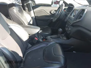 2019 Jeep Cherokee Latitude Plus with VIN 1C4PJMLB2KD261304, listed as a IAAI auction lot 41877500 with 76,442 mi miles and . Bid and sale history available at DreamBid. Image 5.