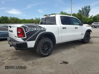 2025 Ram 1500 Rebel z VIN 1C6SRFLP7SN584078, wystawiony jako Copart lot #64027035 z przebiegiem 7 584 mil mil oraz Czysty tytuł • Clean title. Historia ofert i sprzedaży dostępna na DreamBid. Obrazek 3.