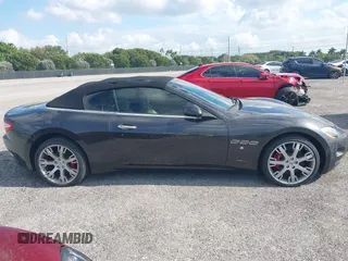 2013 Maserati GranTurismo Convertible Sport with VIN ZAM45MMA2D0069786, listed as a IAAI auction lot 40874830 with 37,312 mi miles. Bid and sale history available at carsss.com. Image 13.