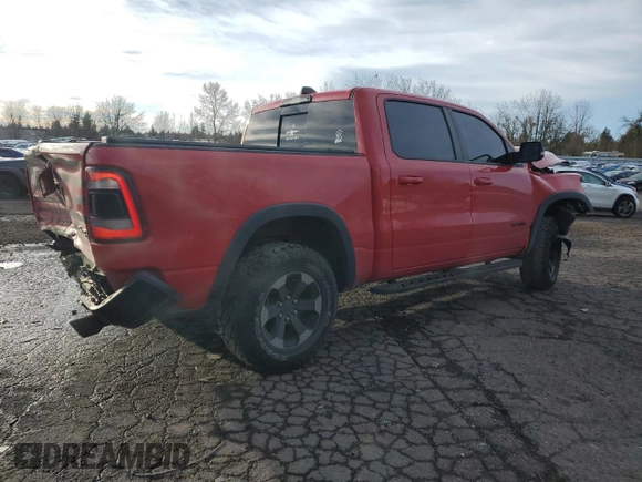 2019 Ram 1500 Rebel с VIN 1C6SRFLT6KN896857, выставлен на аукционе Copart как лот 87077494 с пробегом 48 109 миль миль и Списание • Salvage title. История ставок и продаж доступна на DreamBid. Изображение 3.