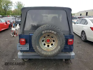 2002 Jeep Wrangler X z VIN 1J4FA39S32P767598, wystawiony jako Copart lot #55974555 z przebiegiem 177 793 mil mil oraz Czysty tytuł • Clean title. Historia ofert i sprzedaży dostępna na DreamBid. Obrazek 6.