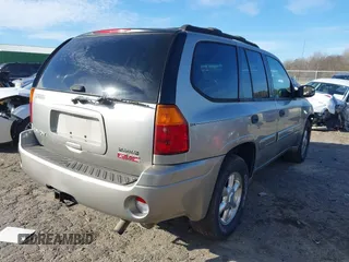 2003 GMC Envoy SLE with VIN 1GKDT13S132377154, listed as a IAAI auction lot 41484891 with 226,008 mi miles. Bid and sale history available at carsss.com. Image 4.