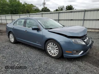 2012 Ford Fusion Hybrid с VIN 3FADP0L32CR184712, выставлен на аукционе Copart как лот 58517555 с пробегом 196 644 миль миль и Списание • Salvage title. История ставок и продаж доступна на DreamBid. Изображение 4.