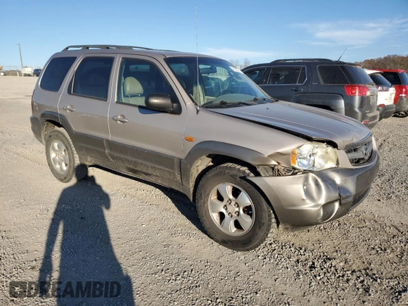 2002 Mazda Tribute LX with VIN 4F2YU09182KM36685, listed as a Copart auction lot 79732664 with 204,262 mi miles and Salvage Title. Bid and sale history available at carsss.com. Image 4.