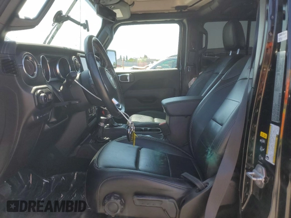2023 Jeep Wrangler Sahara with VIN 1C4JJXP61PW512975, listed as a Copart auction lot 59392075 with 26,954 mi miles and Salvage title. Bid and sale history available at DreamBid. Image 7.
