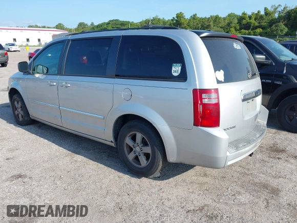 2009 Dodge Grand Caravan SXT z VIN 2D8HN54189R671683, wystawiony jako IAAI lot #42350455 z przebiegiem 220 306 mil mil oraz . Historia ofert i sprzedaży dostępna na DreamBid. Obrazek 3.