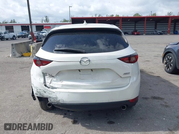 2018 Mazda CX-5 Grand Touring with VIN JM3KFBDM6J0451605, listed as a IAAI auction lot 42099182 with 81,703 mi miles and . Bid and sale history available at DreamBid. Image 16.