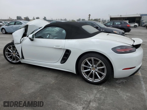2019 Porsche 718 Boxster z VIN WP0CA2A80KS211040, wystawiony jako Copart lot #76409354 z przebiegiem 27 669 mil mil oraz Szkoda całkowita • Salvage title. Historia ofert i sprzedaży dostępna na DreamBid. Obrazek 2.
