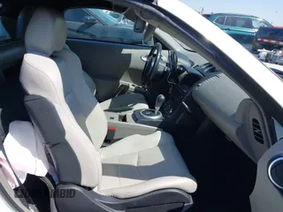 2005 Nissan 350Z Touring z VIN JN1AZ36A45M759863, wystawiony jako IAAI lot #41989643 z przebiegiem 36 758 mil mil oraz . Historia ofert i sprzedaży dostępna na DreamBid. Obrazek 5.