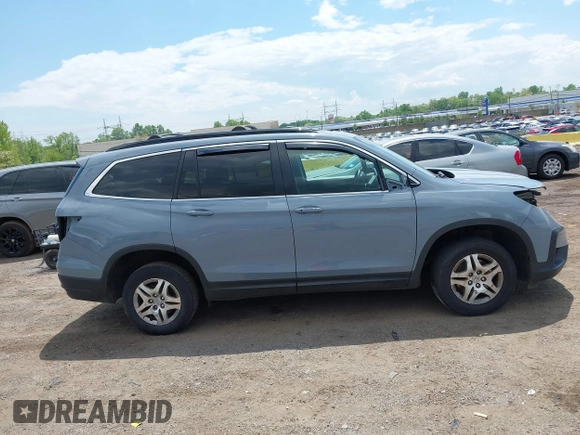 2022 Honda Pilot Special Edition with VIN 5FNYF6H27NB104990, listed as a IAAI auction lot 42219770 with 23,200 mi miles and . Bid and sale history available at DreamBid. Image 13.