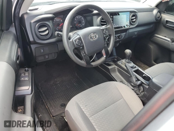 2023 Toyota Tacoma SR with VIN 3TYSX5ENXPT018099, listed as a Copart auction lot 52520145 with 15,640 mi miles and Salvage title. Bid and sale history available at DreamBid. Image 8.