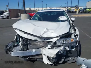 2018 Honda Civic EX with VIN 2HGFC2F71JH502564, listed as a IAAI auction lot 41933157 with 56,696 mi miles and . Bid and sale history available at DreamBid. Image 12.