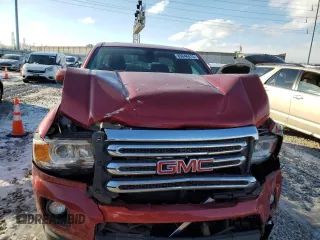 2015 GMC Canyon 4WD SLE with VIN 1GTH6BE3XF1180185, listed as a Copart auction lot 89046915 with 0 mi miles and Salvage Title. Bid and sale history available at carsss.com. Image 5.