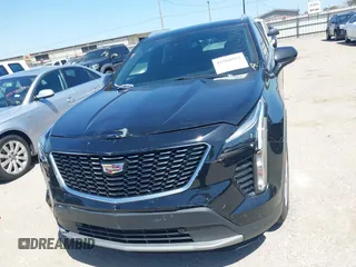 2019 Cadillac XT4 FWD Premium Luxury with VIN 1GYFZCR48KF141478, listed as a IAAI auction lot 41988092 with 53,970 mi miles and . Bid and sale history available at carsss.com. Image 12.