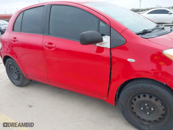2009 Toyota Yaris with VIN JTDKT903295244022, listed as a IAAI auction lot 41615570 with 165,964 mi miles. Bid and sale history available at carsss.com. Image 6.