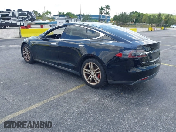 2015 Tesla Model S 85D with VIN 5YJSA1H21FFP79565, listed as a IAAI auction lot 42076401 with 162,139 mi miles. Bid and sale history available at carsss.com. Image 3.