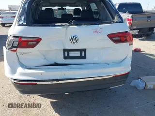 2021 Volkswagen Tiguan SE with VIN 3VV3B7AX9MM051920, listed as a IAAI auction lot 41826721 with 127,699 mi miles and . Bid and sale history available at DreamBid. Image 6.