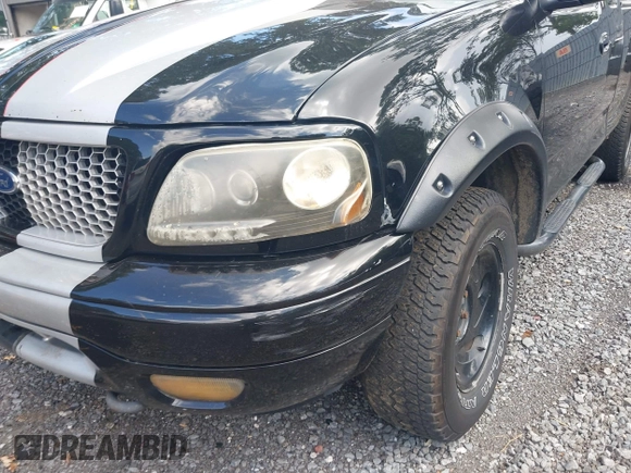 2001 Ford F-150 XLT z VIN 1FTRW08L91KE74815, wystawiony jako IAAI lot #42679387 z przebiegiem 201 258 mil mil oraz . Historia ofert i sprzedaży dostępna na DreamBid. Obrazek 6.